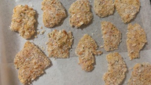 Lay the nuggets on a tray and spray with oil