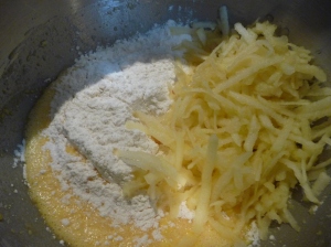 Lightly fold in the flour and apple