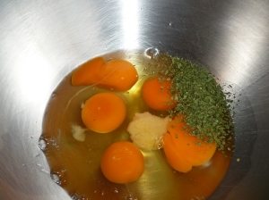 Whisk eggs with garlic and any herbs or seasoning to your liking!