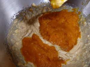 add the mashed pumpkin to the mixed butter, sugar, egg and vanilla mixture 